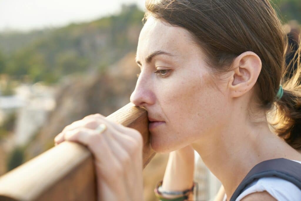 Woman looking sad because she is in need of TMS treatment